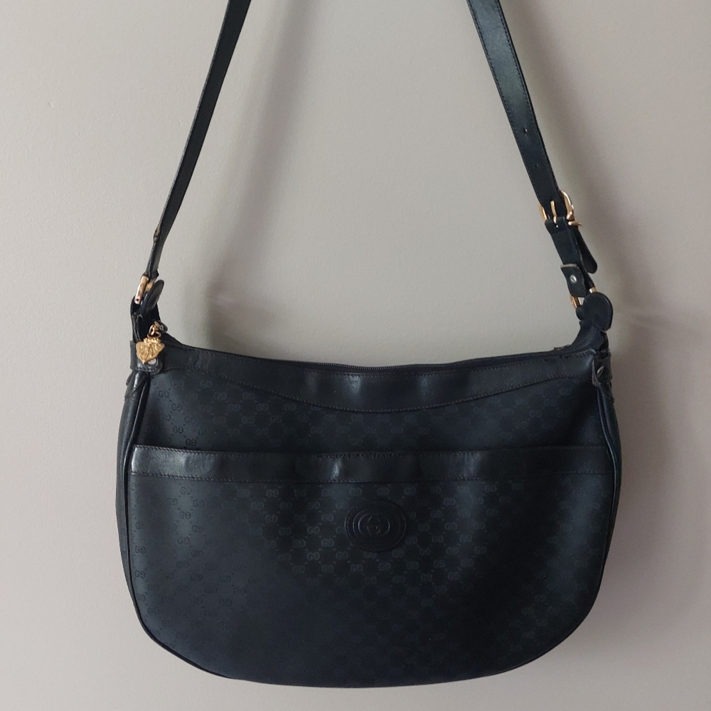 Vintage Gucci black curved crescent shaped  shoulder crossbody bag.